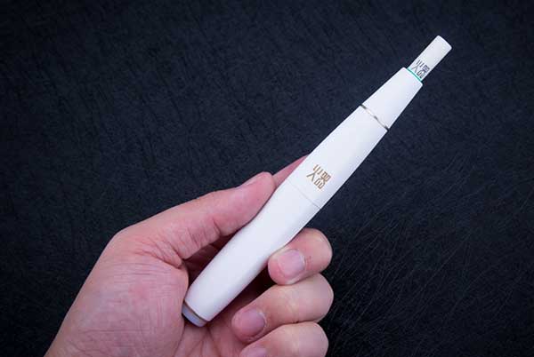 Is there any harm in using e-cigarettes instead of regular cigarettes?