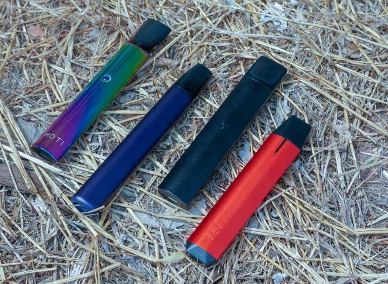 A Comparative Review of Four Representative Compact Vaping Devices
